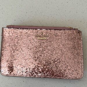 New, never used Kate Spade pink sparkles wristlet.